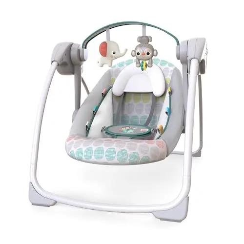 Bright Starts portable baby swing in Whimsical Wild pattern with toy bar