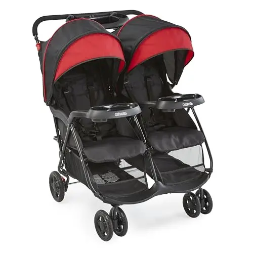 Kolcraft Cloud Plus double stroller in red and black showing standing fold and storage trays