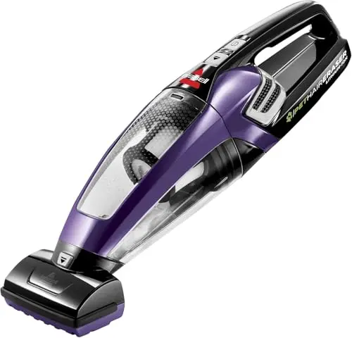 BISSELL Pet Hair Eraser cordless hand vacuum removing fur from a sofa