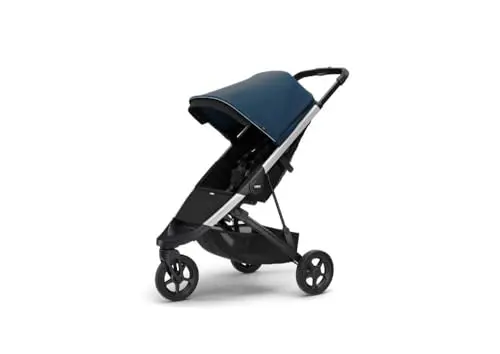 Thule Spring stroller in Majolica Blue showing compact fold and urban design