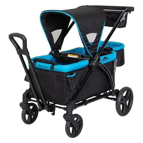 Baby Trend Expedition wagon stroller with blue canopy and storage compartments