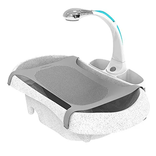 The First Years Rain Shower baby bathtub showing white design with shower head and infant sling