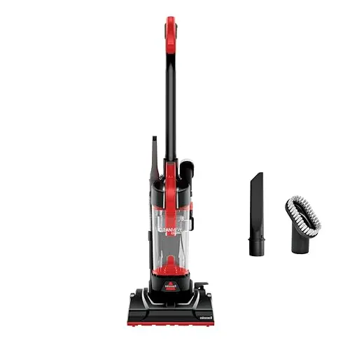 Bissell CleanView Compact vacuum cleaner on a small rug