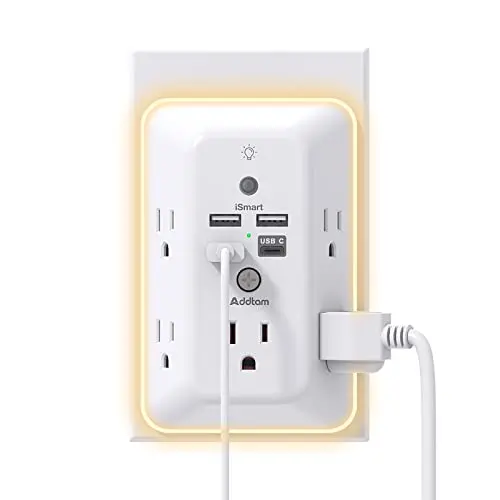 Addtam surge protector with multiple outlets and USB ports mounted on wall
