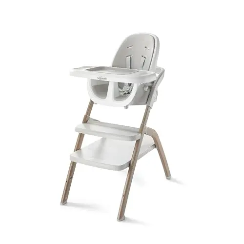 Graco EveryStep slim high chair with wood grain finish