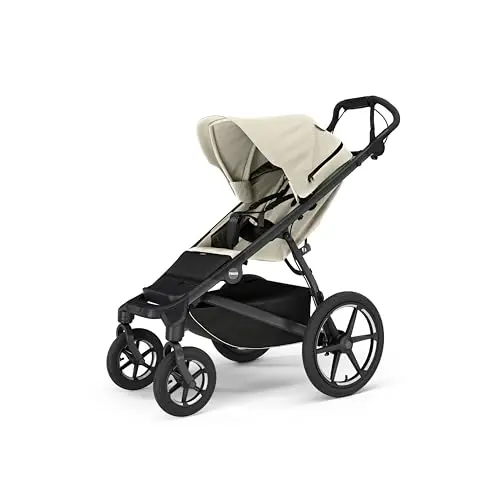 Thule Urban Glide 4-wheel stroller in soft beige with air-filled tires and suspension