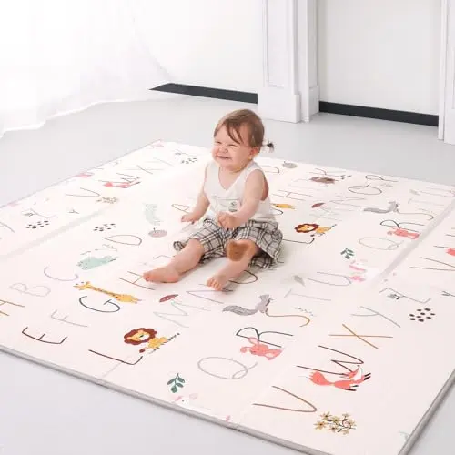 Joypony dual-sided baby play mat with fabric and XPE foam surfaces for versatile use
