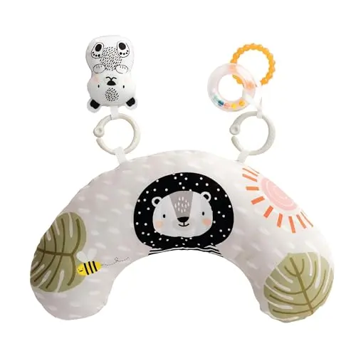 Taf Toys ergonomic tummy time cushion with attached teether and rattle toys in soft colors