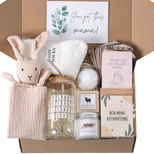 New mom care package with affirmation cards, candle, socks, and baby lovey