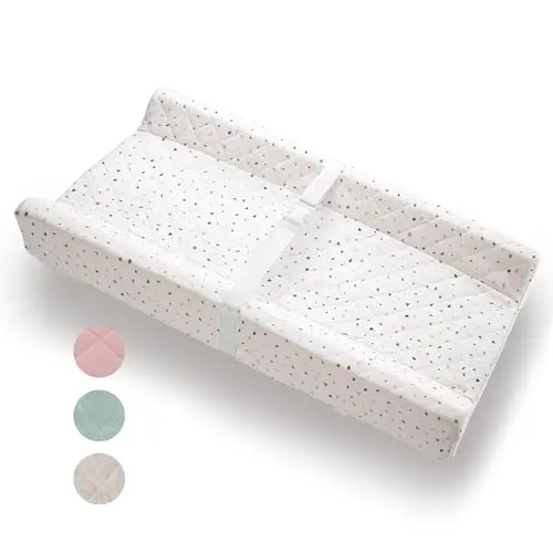 Modera organic cotton changing pad with removable cover on a changing table