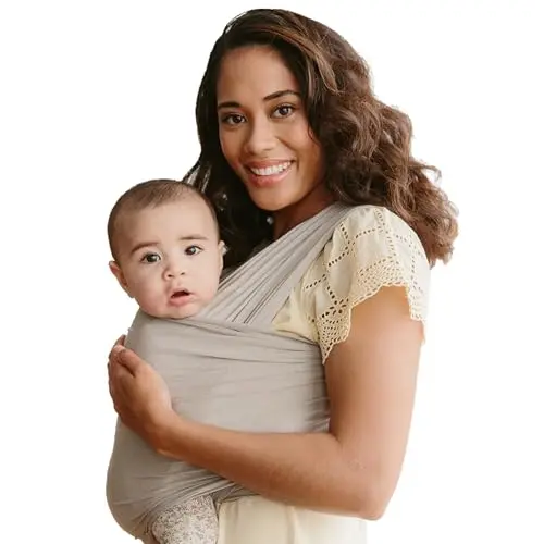 Solly Baby wrap carrier in spelt color being worn indoors