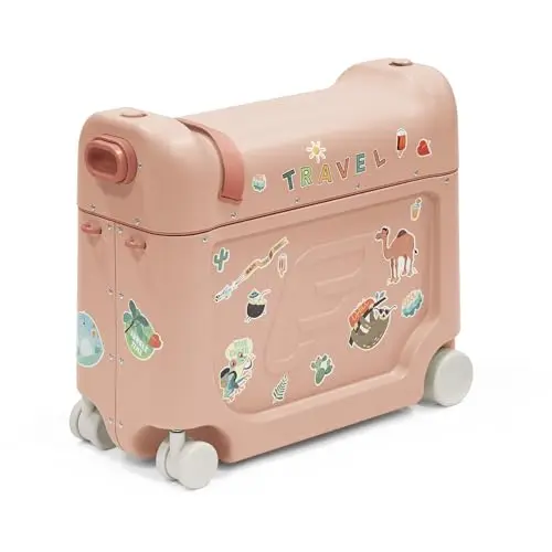 Stokke JetKids BedBox ride-on suitcase that transforms into a bed in coral pink