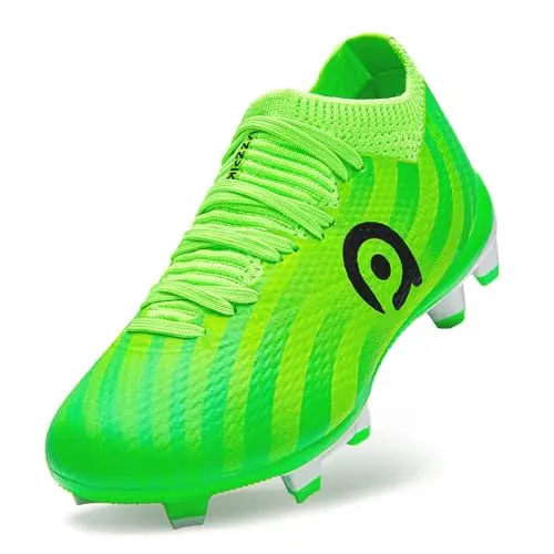 Generic kids soccer cleats with green color on field