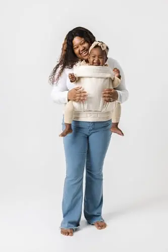 Mabē Monarch baby carrier in ivory color showing adjustable straps