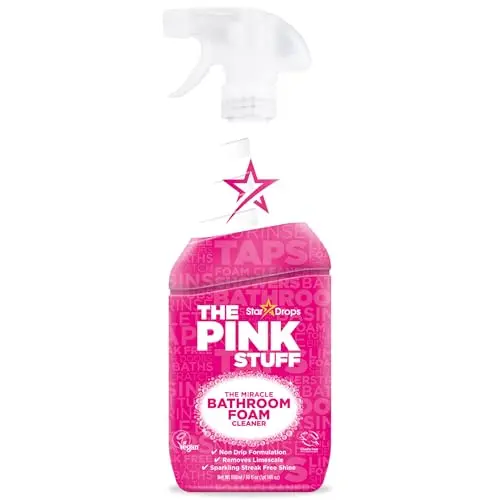 The Pink Stuff bathroom foam cleaner clinging to tile surface