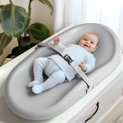 Mallify wipe-clean changing pad with adjustable safety belt